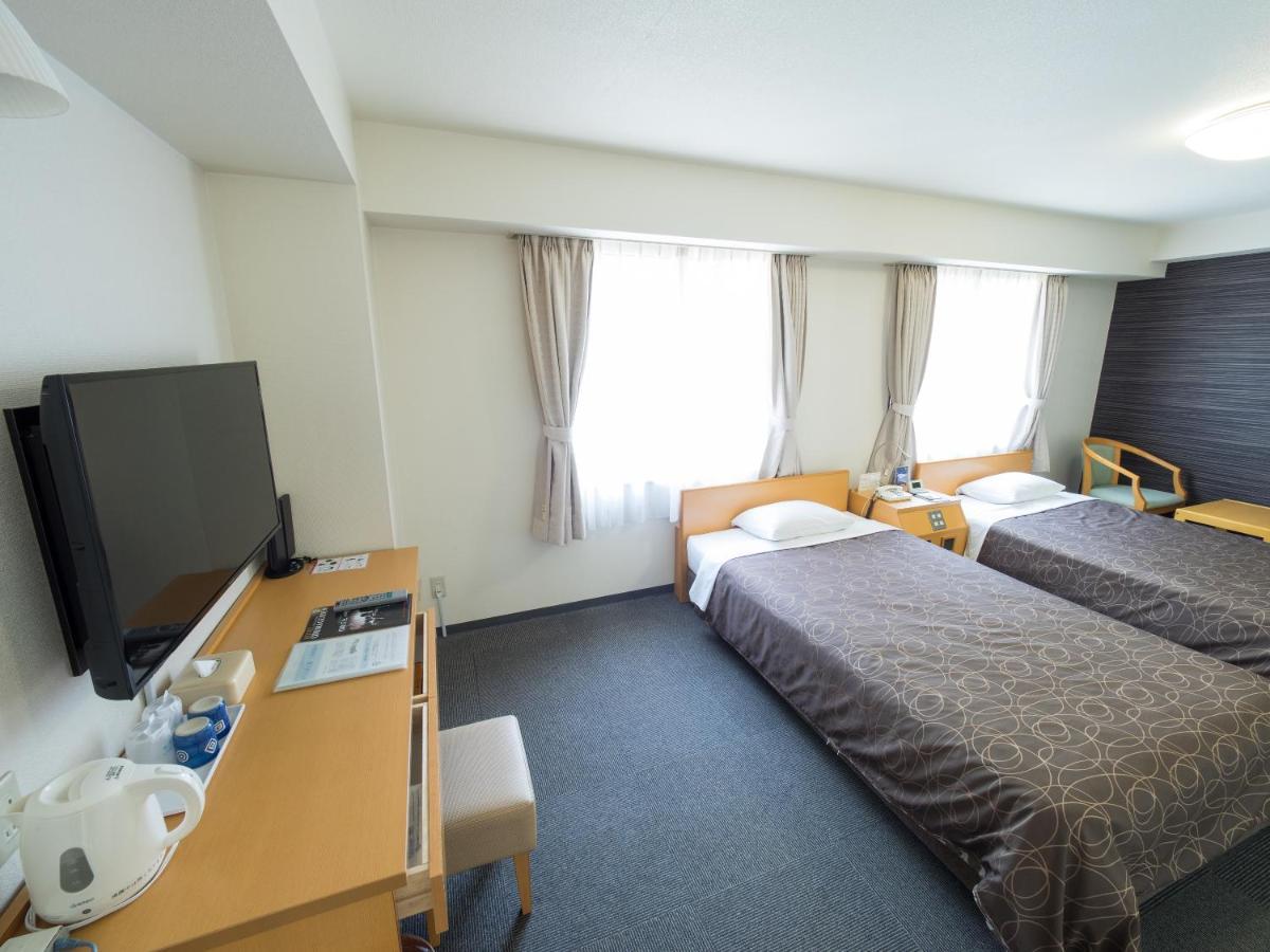 Hotel Shin Осака Экстерьер фото