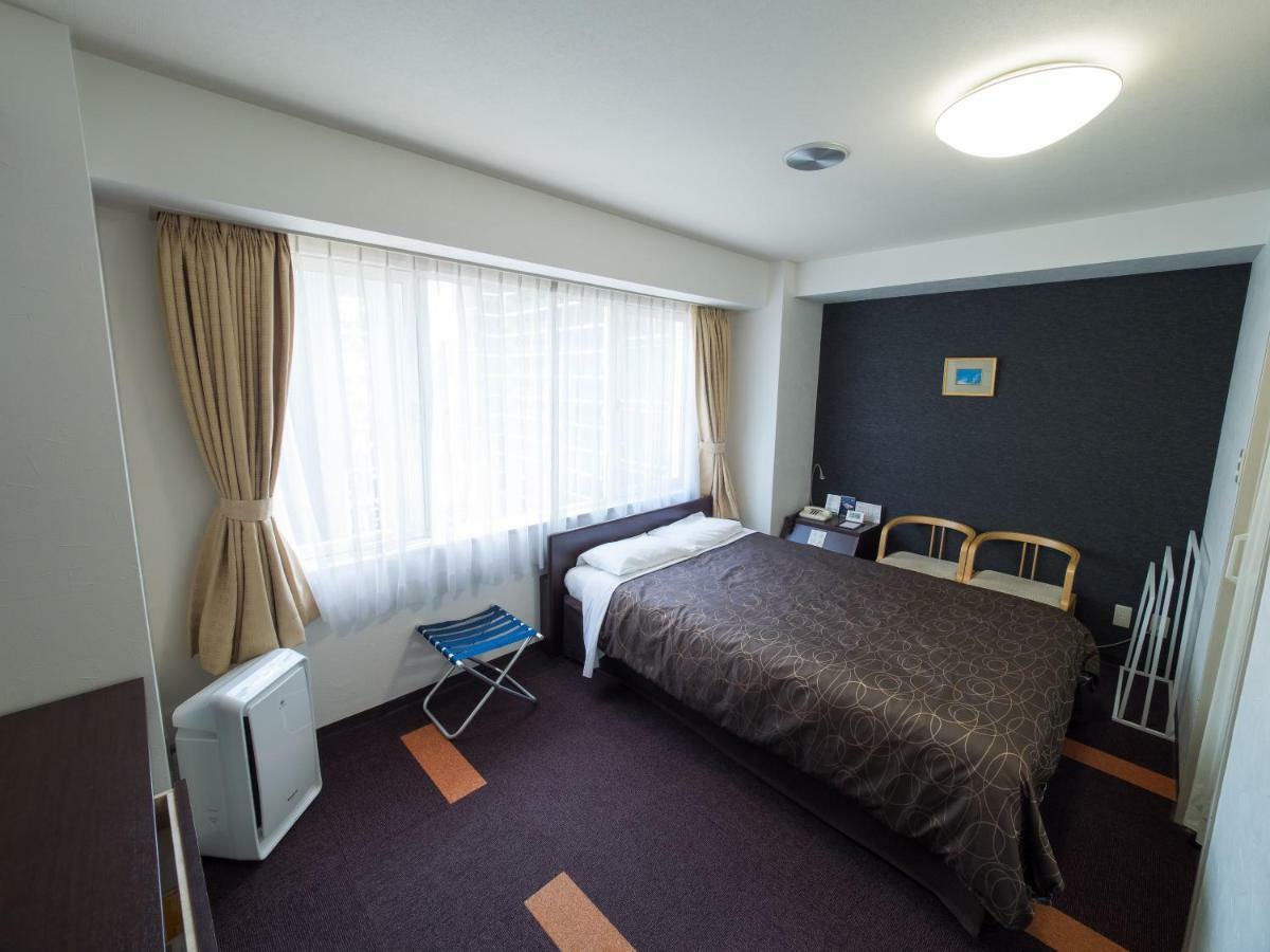 Hotel Shin Осака Экстерьер фото