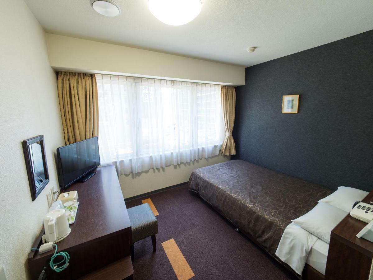 Hotel Shin Осака Экстерьер фото